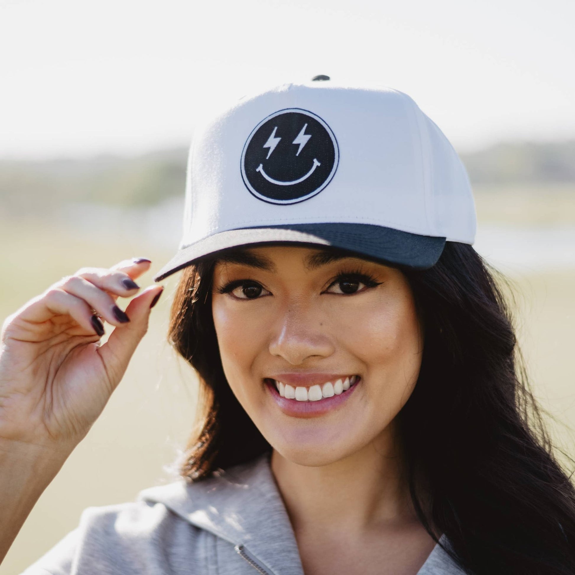 Black Lightning Happy Face Trending Vintage Hat: Black and White - Bria Blair Creative