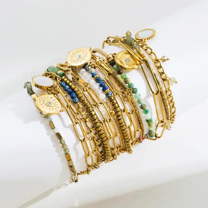 Gold Braclet with blue charms and eye pendent - Bria Blair Creative