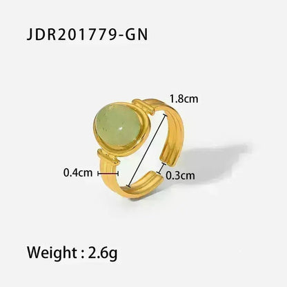 Gold Ring with Green Gem Center - Bria Blair Creative